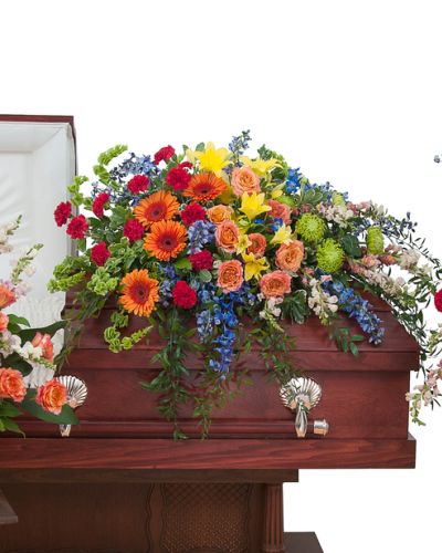 The Treasured Memories trio includes a casket spray, standing easel spray and crescent urn arrangement.