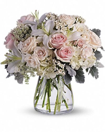<div class="m-pdp-tabs-description">
<div id="mark-1" class="m-pdp-tabs-marketing-description">A whisper-quiet affirmation of love. Subtle shadings of pink and white roses, lilies and delicate Queen Anne's lace in a simple, elegant vase.</div>
</div>
<p id="arrngDescp">Gorgeous flowers such as white, crème and light pink roses, white oriental lilies and delicate Queen Anne's lace with a touch of silvery dusty miller, all in a classic vase.</p>