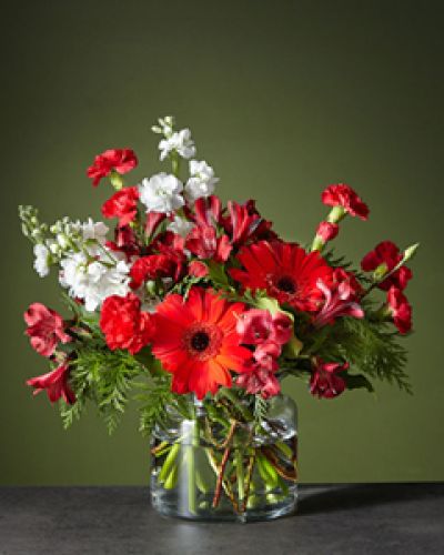 <div class="row">
<div class="truncated">
<p>The Big Red Bow bouquet will add the perfect finishing touch to any room's holiday décor. Let the cherry red gerbera daises steal the show while the white stock adds balance and softens the vibrant arrangement.
</p></div>
</div>
<div id="accordion-container" class="product-detail-step-one product-page">
<div id="accordion" class="panel-group">
<div class="panel panel-default">
<div class="panel-heading">
<h4 class="panel-title"></h4>
</div>
</div>
</div>
</div>
