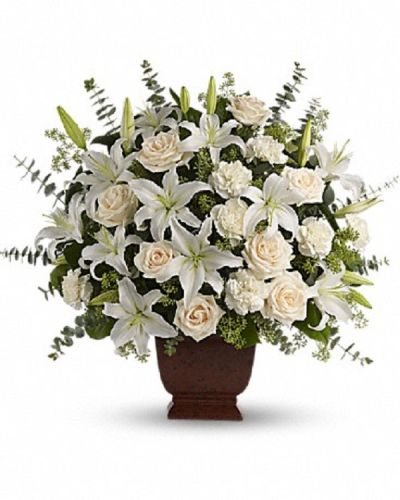 <div class="m-pdp-tabs-description">
<div id="mark-1" class="m-pdp-tabs-marketing-description">A simply beautiful way to show you care. By sending this elegant arrangement to the home of those in mourning, you are letting them know they are embraced in your thoughts. And in your heart.</div>
</div>
<p id="arrngDescp">Fresh flowers such as crème roses, white oriental lilies, carnations, eucalyptus and more designed to honor their memory lovingly.</p>