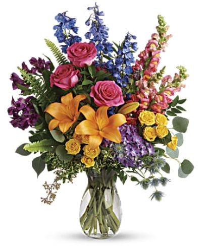 <div id="mark-3" class="m-pdp-tabs-marketing-description">A rainbow of beauty for any occasion. Purple hydrangea, pink roses and orange lilies positively pop in this bright bouquet, featuring all the colors of the rainbow.</div>
<p> </p>
<div id="desc-3">
<ul>
<li>This colorful bouquet includes purple hydrangea, pink roses, yellow spray roses, orange asiatic lilies, purple alstroemeria, blue delphinium, pink snapdragons, blue eryngium, huckleberry, oregonia, Israeli ruscus, sword fern, silver dollar eucalyptus, seeded eucalyptus, and lemon leaf.</li>
</ul>
</div>