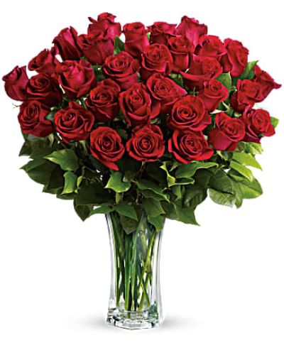 Shout your love from the rooftops with long stemmed red roses artistically arranged in a cut crystal vase. These red roses make a spectacular romantic bouquet. She'll be yours forever.
Standard- 24 Elegant Roses
Deluxe-30 Beautiful Blooms
Premium-36 Exquisite Roses