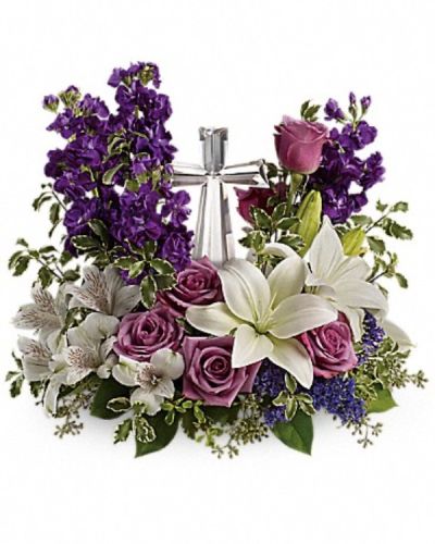 <div class="m-pdp-tabs-description">
<div id="mark-2" class="m-pdp-tabs-marketing-description">A bouquet to remember. This glorious garden of roses, lilies and alstroemeria surrounds a gleaming Crystal Cross. It's a radiant, reverent expression of faith that will be appreciated for years to come.</div>
</div>
<p id="arrngDescp">Lavender roses, white asiatic lilies, white alstroemeria, purple stock and purple seafoam statice are arranged with fresh pitta negra, seeded eucalyptus and lemon leaf. Delivered with a Crystal Cross keepsake.</p>