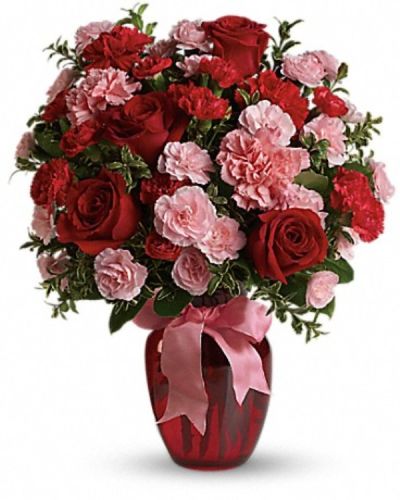 <div class="m-pdp-tabs-description">
<div id="mark-2" class="m-pdp-tabs-marketing-description">True romance will bloom brighter than ever when you surprise her with this dazzling bouquet of red roses, red carnations and other favorites in a chic ruby red vase. "Surprise" is the key word. That's when flowers mean the most.</div>
</div>
<p id="arrngDescp">This gorgeous bouquet includes red roses, red carnations, light pink carnations, red miniature carnations, light pink miniature carnations and green rhamnus accented with assorted greenery and a pink satin ribbon. Delivered in a ruby rose vase.</p>